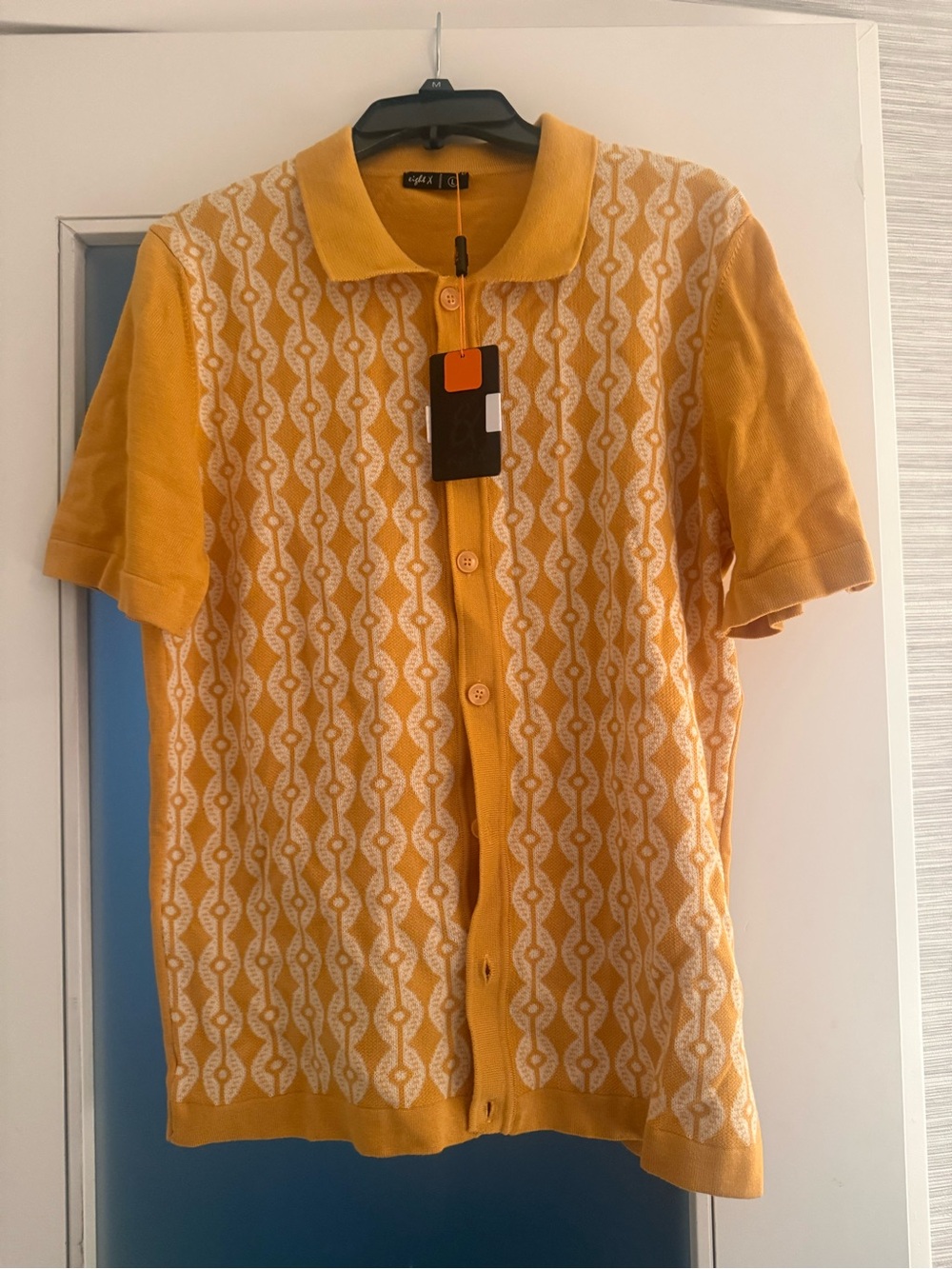 Vintage-Inspired Mustard Yellow Knit Polo Shirt with Geometric Pattern